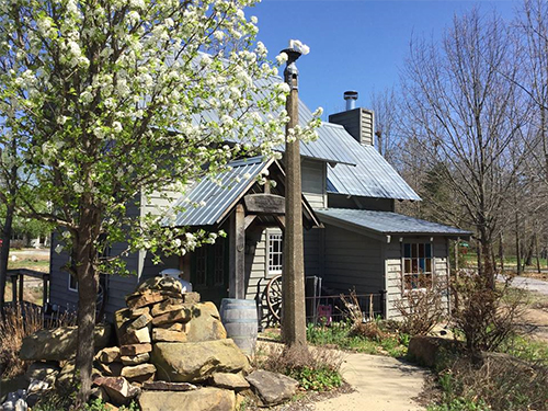 the covered bridge at the big red barn